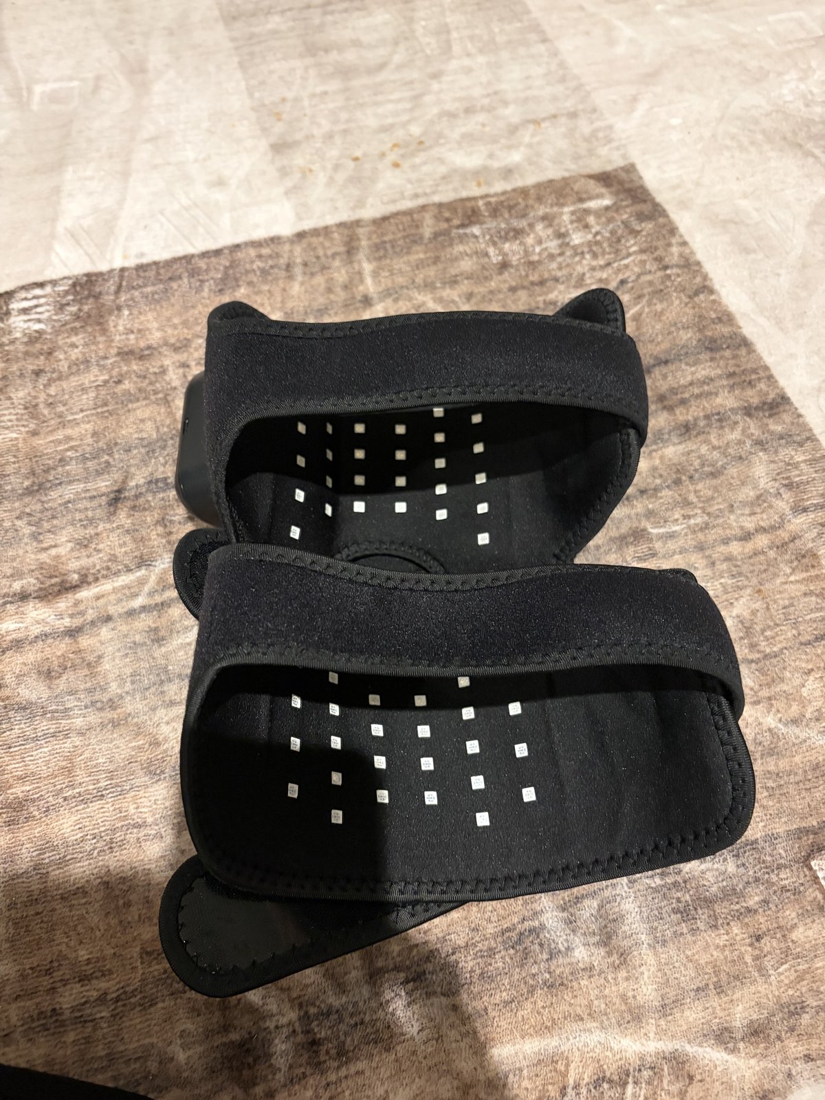 Inside of the knee brace showing the red-light emitter array on the contact panel